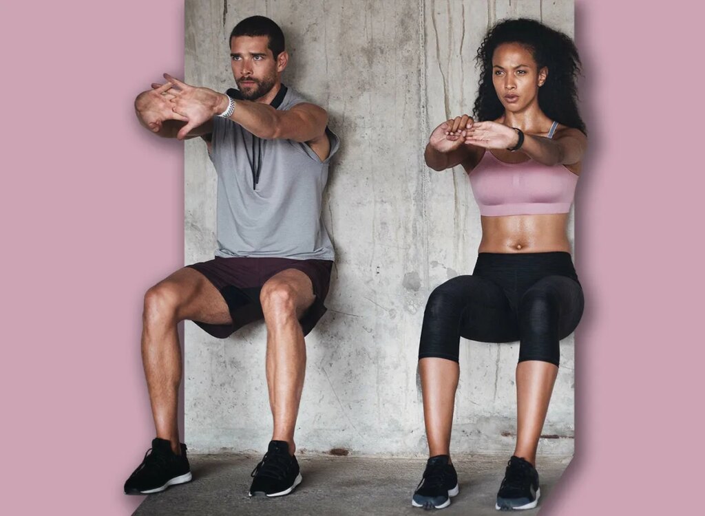 couple wall sit exercise 2391557293.jpg