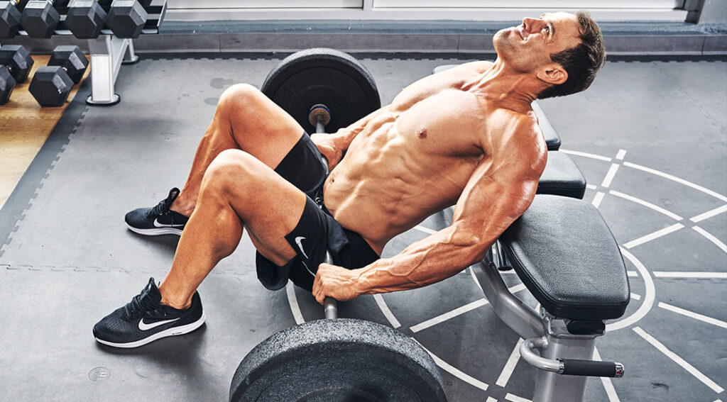 Are Hip Thrusts Puffed up? The Reality About This Glute-Development Staple man gym barbell hip thrust 1109.jpg