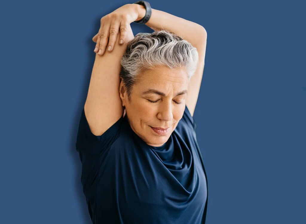 Status Workouts That Company Arm Jiggle After 60 mature woman overhead arm stretch 2330422127.jpg