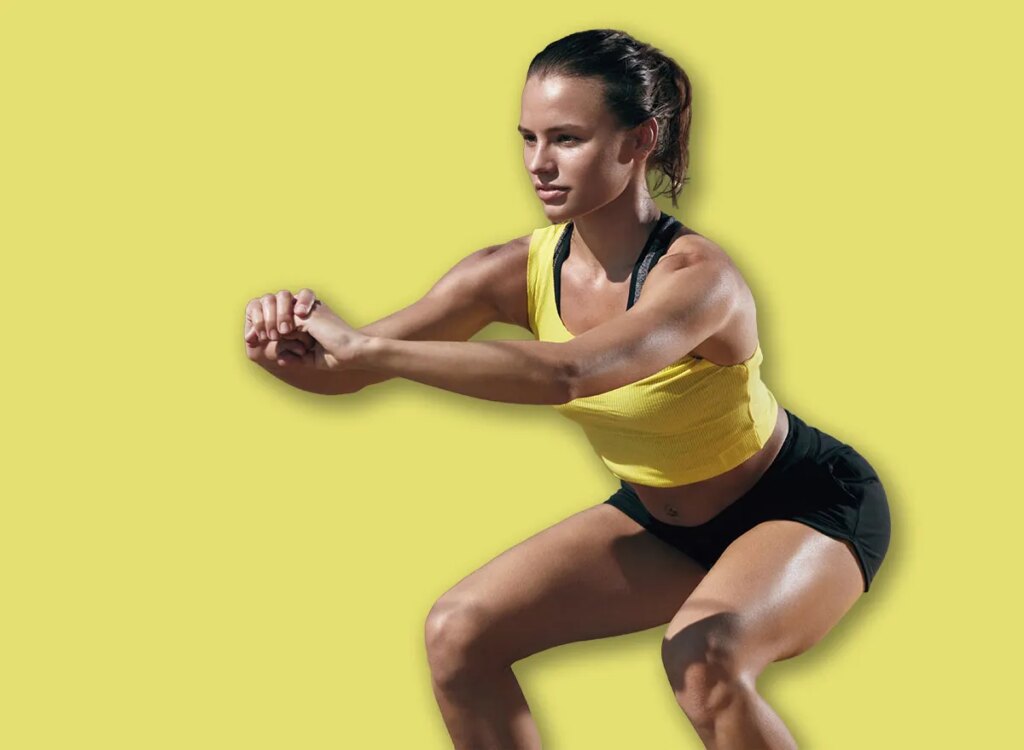 woman bodyweight squats exercise 1481675204.jpg