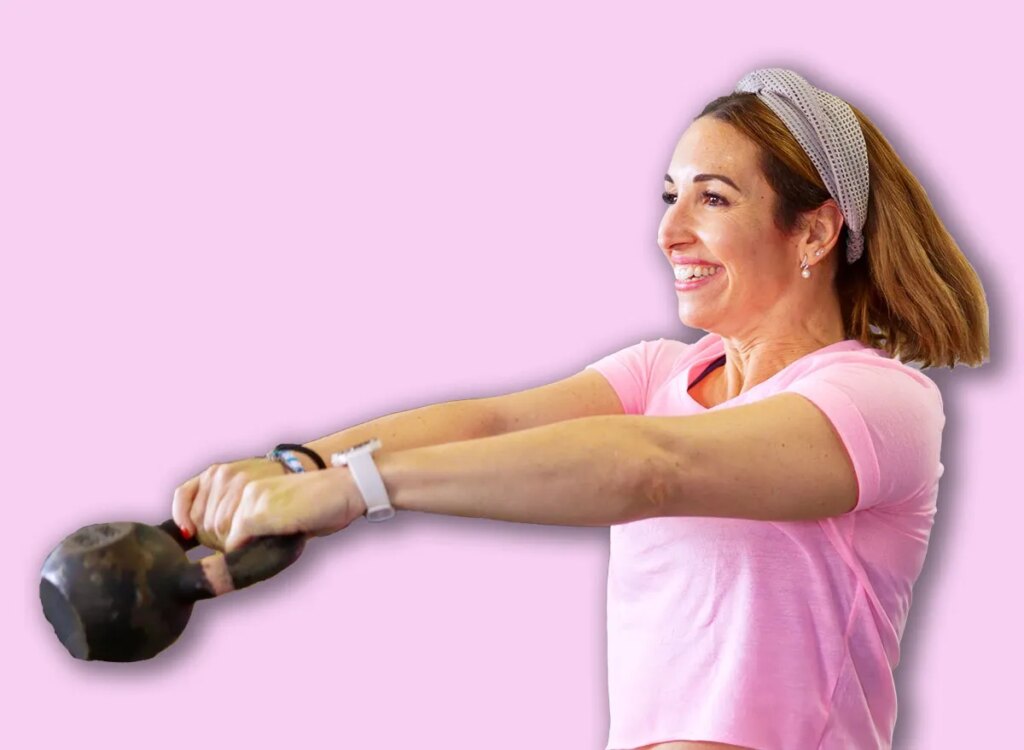 woman kettlebell swings exercise 2754633777.jpg