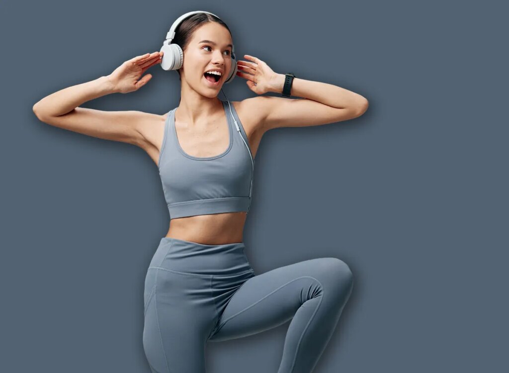 woman standing side knee raises exercise 2711859445.jpg