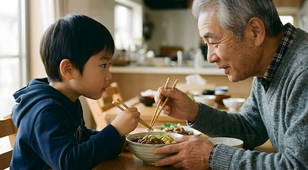 elderly japanese man eating with a young japanese boy practicing hara hachi bu diet method.jpg