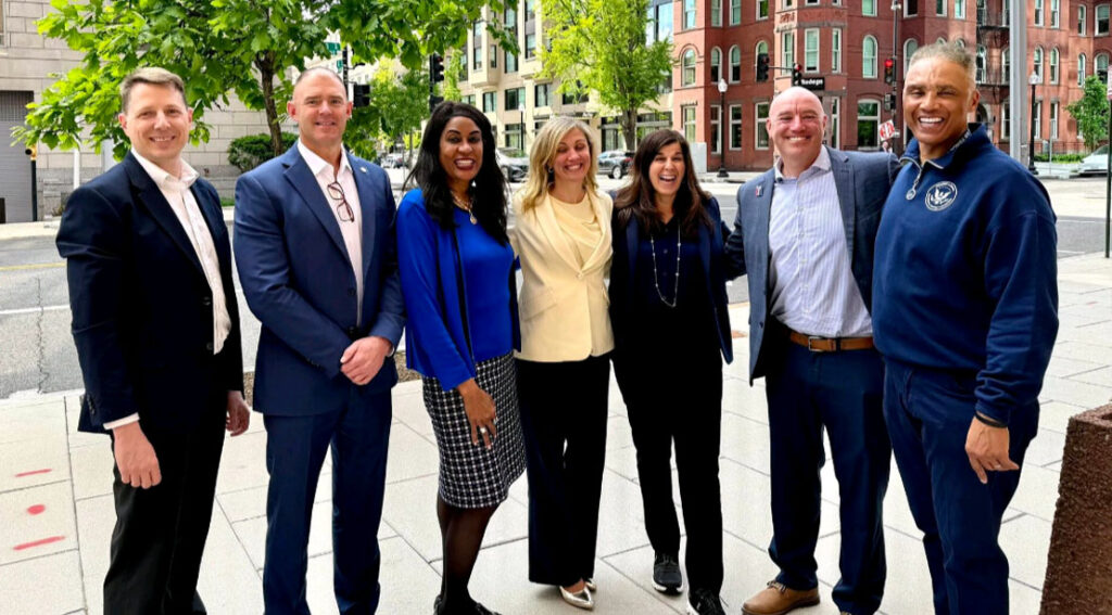 5 Key Takeaways From Spring 2026 Army Wellness Symposium senior military editor honorable rob wilkins with the leaders of the 2026 military wellness symposiu.jpeg