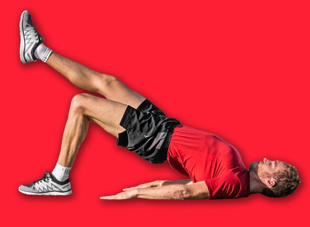 man glute bridge kick exercise 700503577.jpg