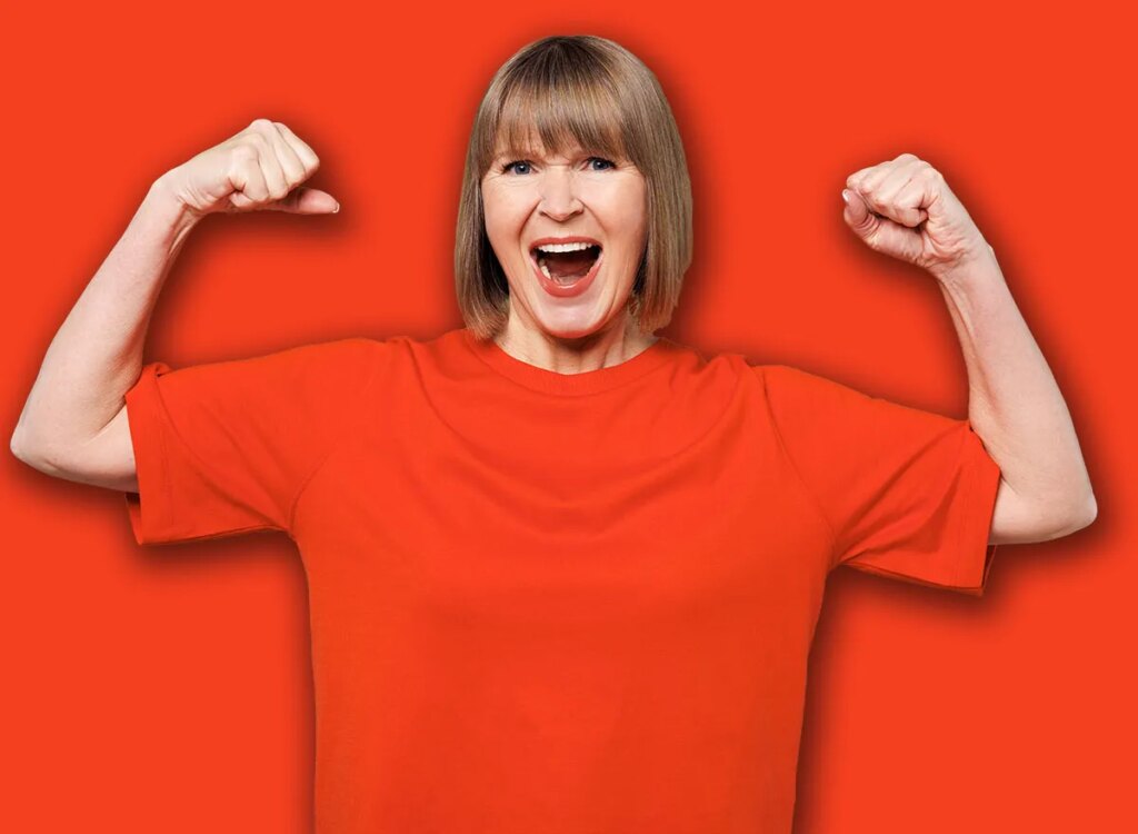 4 Morning Workouts To Repair Arm Energy After 55 mature woman flexing biceps muscles 2518399891.jpg