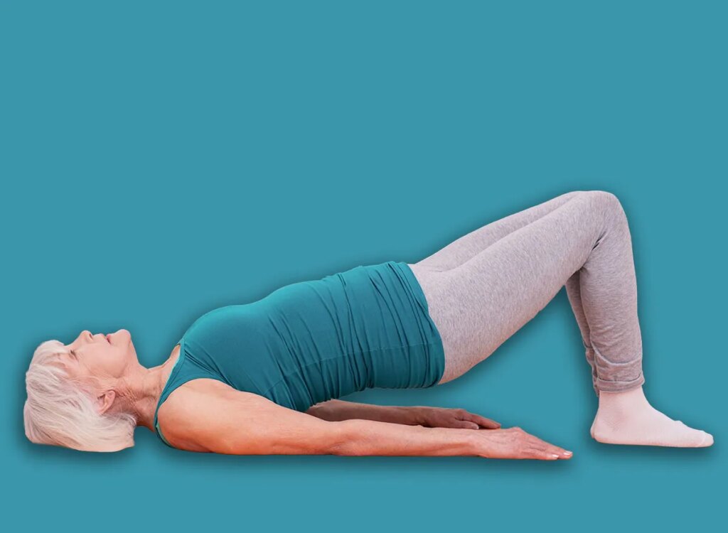 mature woman glute bridges exercise 1081872815.jpg