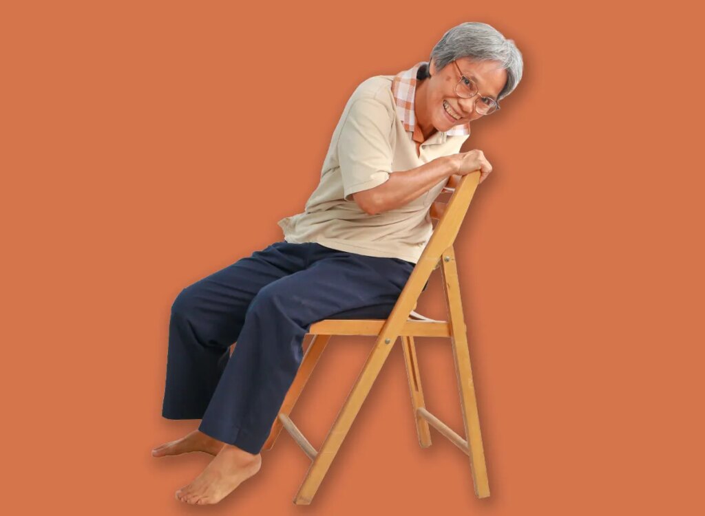 mature woman sitting on a chair 1498846511.jpg