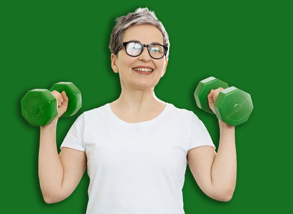 middle aged woman dumbbell exercise 2756478593.jpg