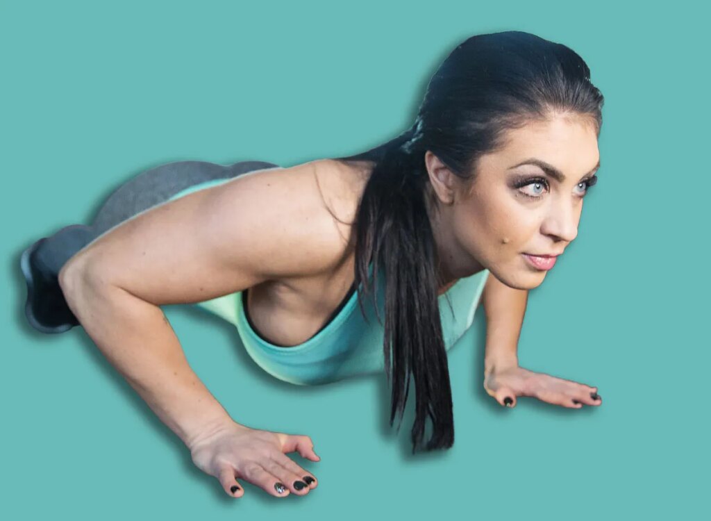 middle aged woman pushups exercise 547295224.jpg