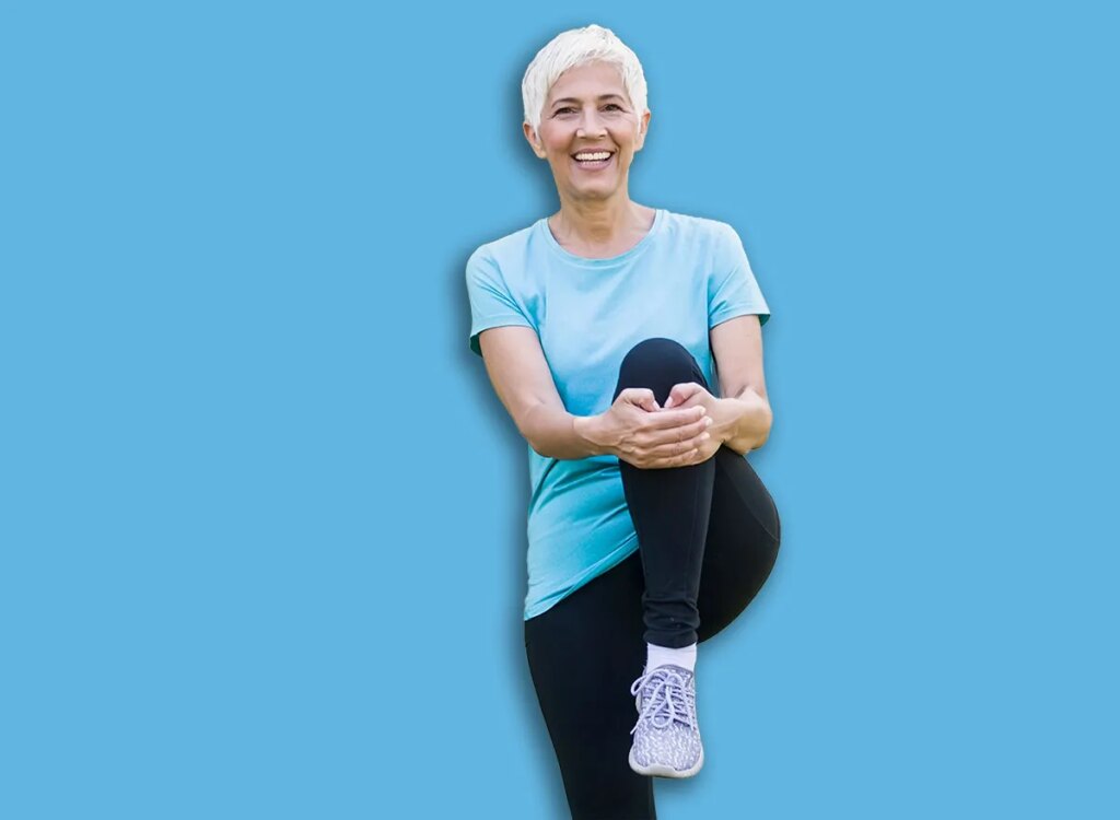 senior woman doing streching exercise 1210018837.jpg