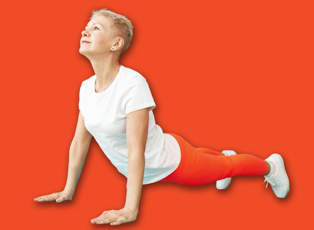 woman cobra pose exercise 2277987281.jpg