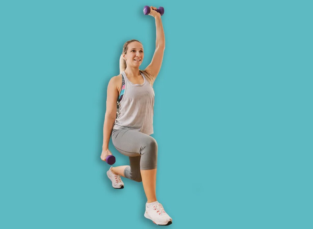 woman kneeling shoulder press exercise 2107083899.jpg