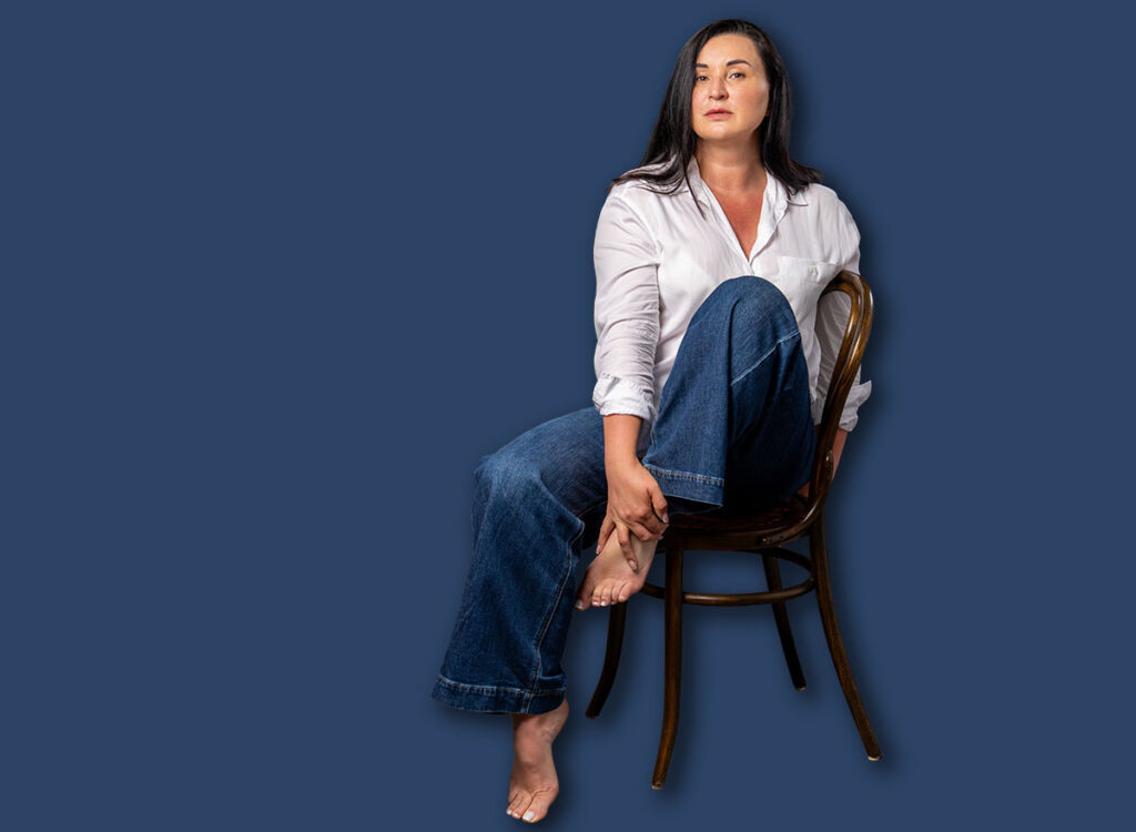 woman sitting on a chair 2736489043.jpg