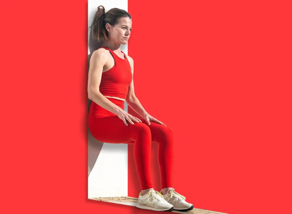 Your Decrease-Frame Energy After 50 woman wall sit exercise 2574207321.jpg