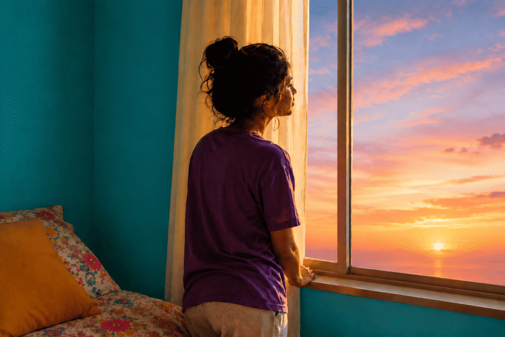 Embracing Gradual Expansion: The Large Turning Level That By no means Got here woman looking out window.png