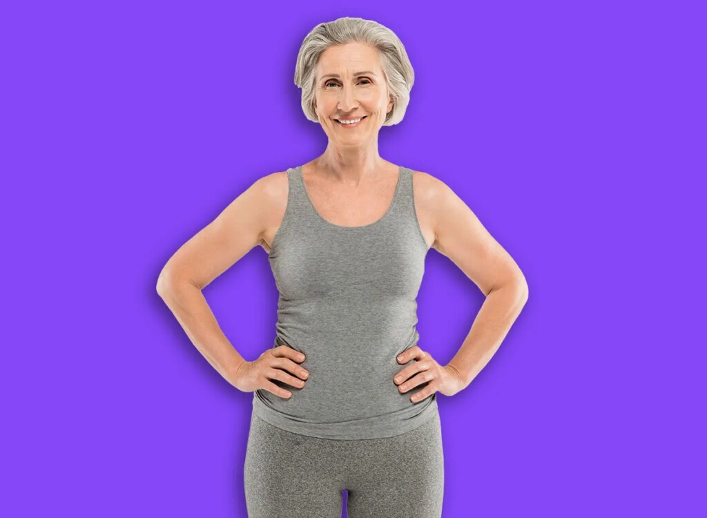 mature fit woman with hands on hips 2286109961.jpg
