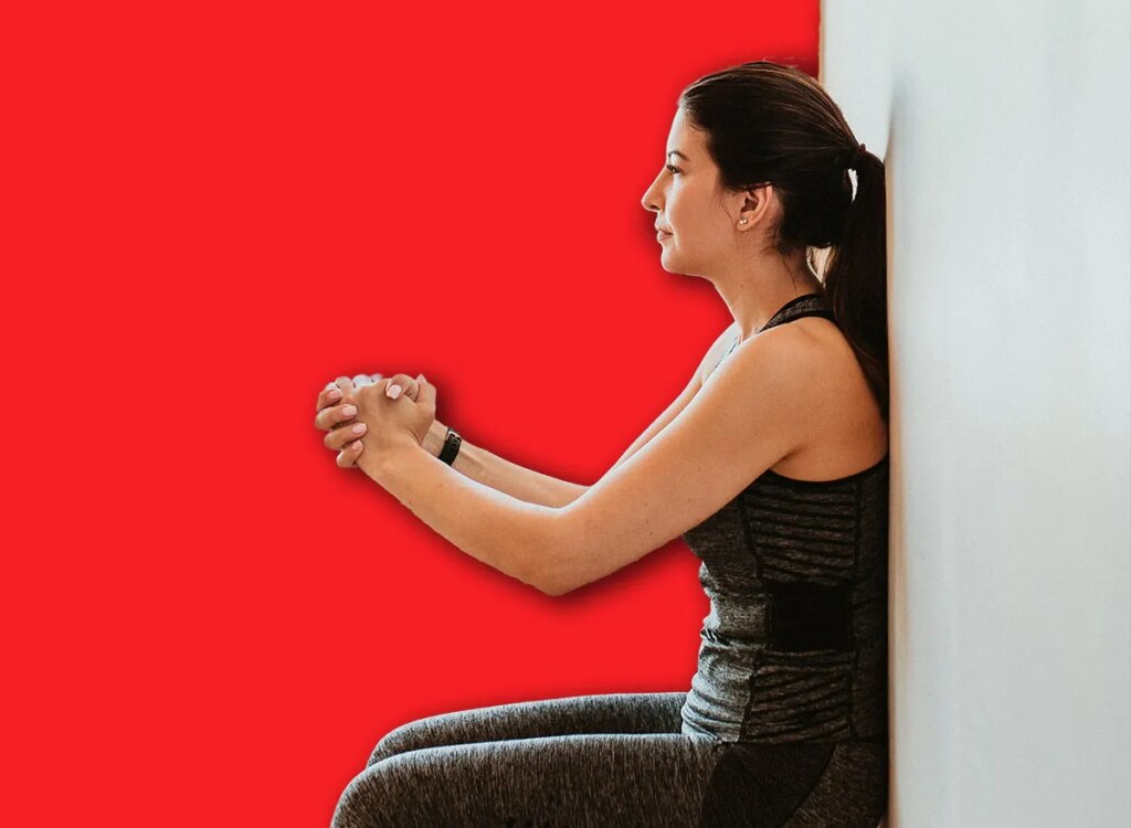 woman wall sit exercise 1995397502.jpg