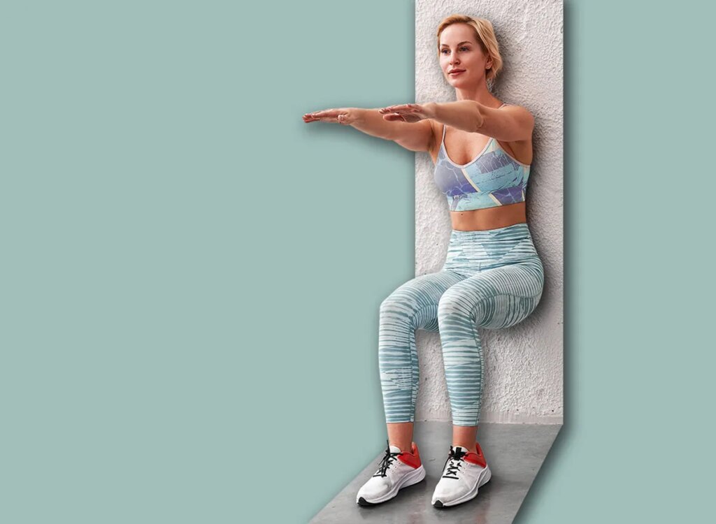 5 Status Workout routines To Repair Quad Power After 60 woman wall sit exercise 2551605041.jpg